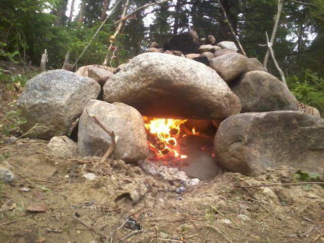 Heating up the primitive sauna stove