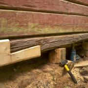 replacing bad parts at neighbour's log cabin