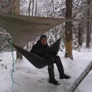 a hammock with a rain cover